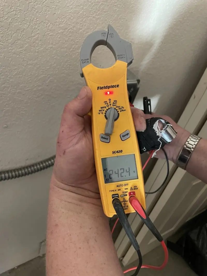 Voltage testing with clamp meter during Recessed Lighting Installation in Lehigh